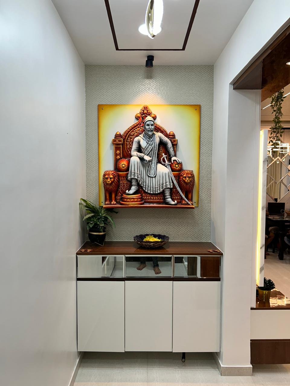 Compact altar and storage interior composition by Doric & Co. Pune